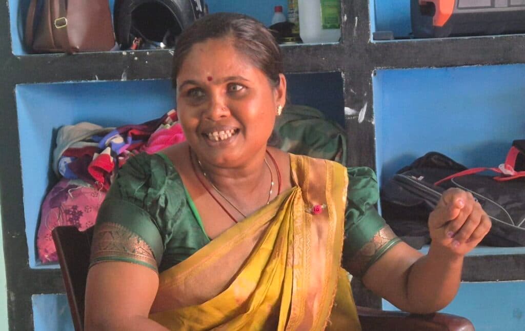 A portrait of South Asian woman sitting and talking